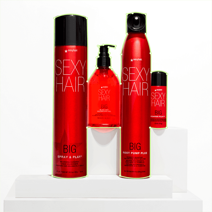 Sexy Hair red product lineup on white podium